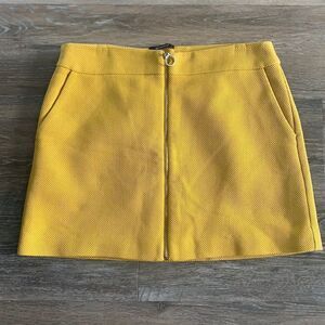 Promod mini skirt with zip front and side pockets gold color sz 8